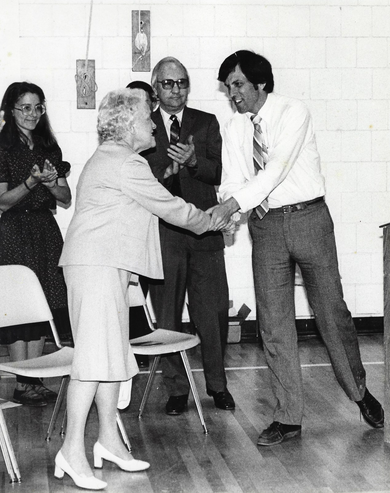 Tom Farrell shaking hands with Senator Margaret Chase Smith